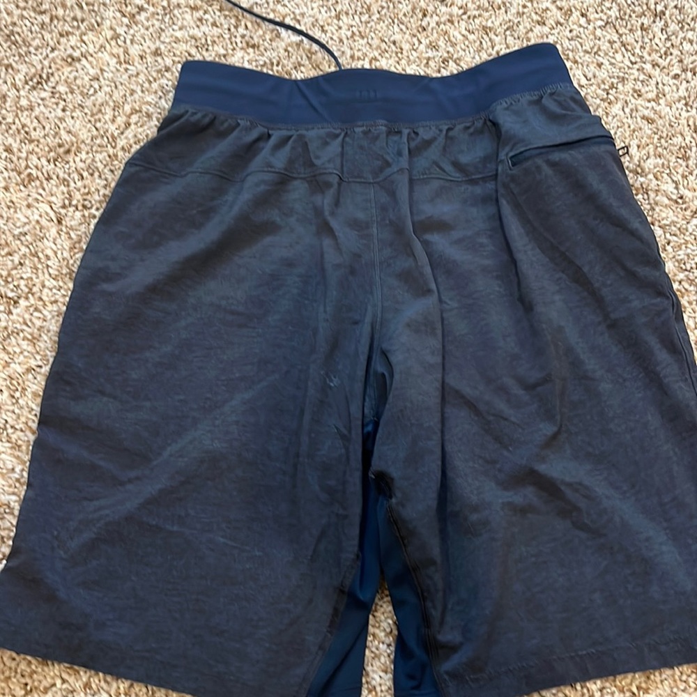 Mens Lululemon shorts size xs heather blue in color